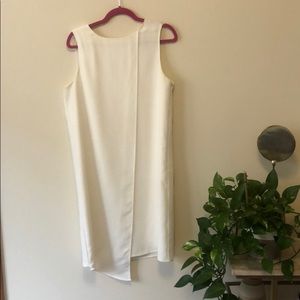 White shift occasion dress, with overlayer detail